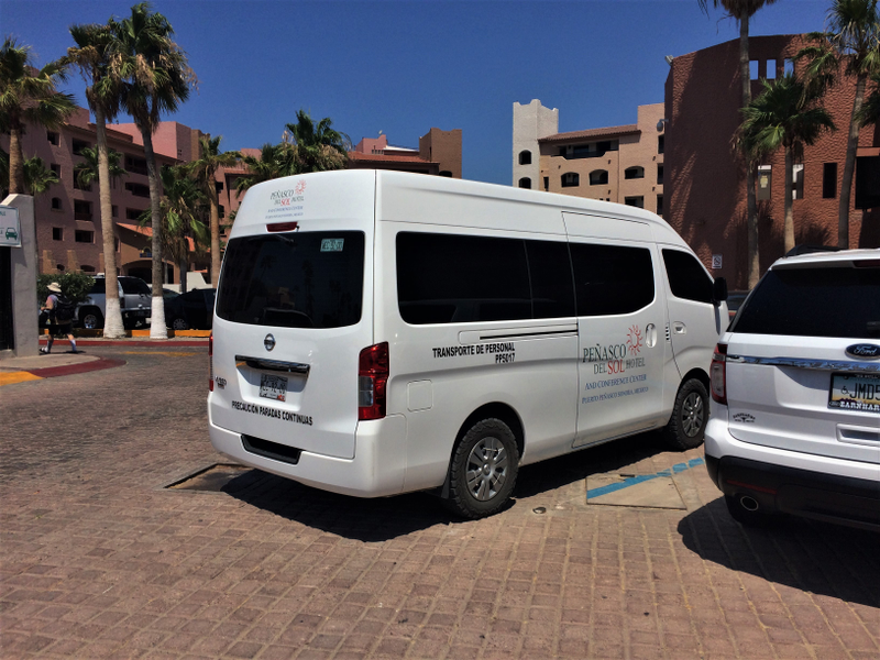 Sure it’s just an ordinary cabover passenger van, but check out those knobbly tires and the zip-tied wheel covers!